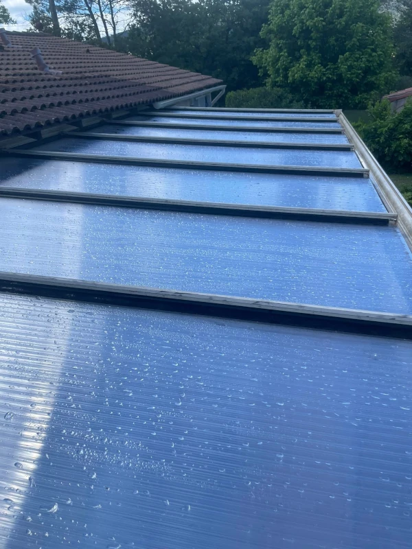 remplacement plaques en polycarbonate de veranda après travaux